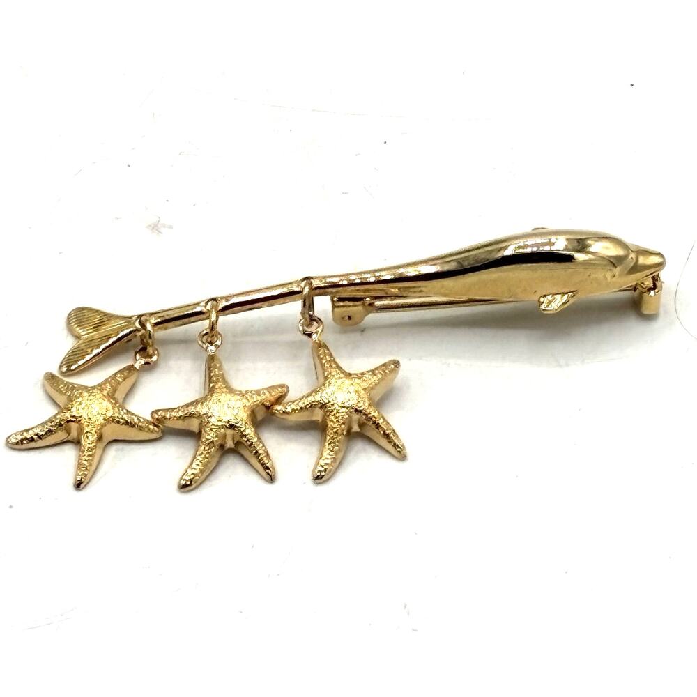 Vintage Gold Tone Dolphin Brooch Pin w/ 3 Dangle Starfish Ocean Beach Theme